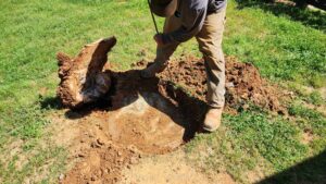 5 Simple Tips for Septic System Maintenance in Upstate SC - man locating the septic tank in anderson or greenwood sc